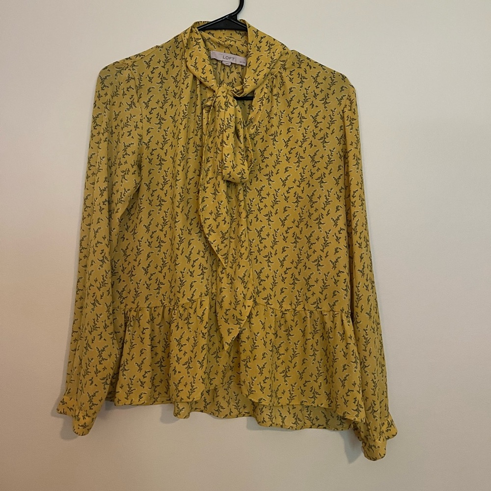 Yellow peplum blouse